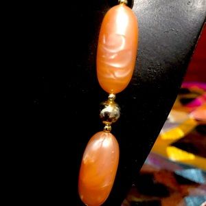 Peach and gold tone 18 inch necklace